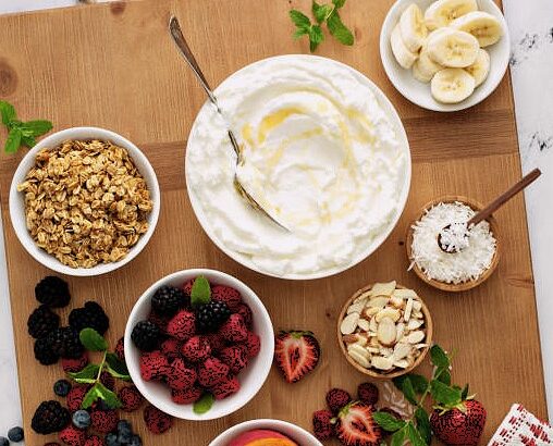 Yogurt bowl bar, big board with variety of toppings